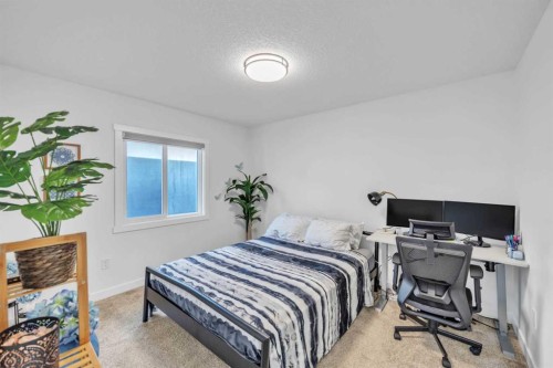 97 Baysprings Gardens Sw, Airdrie, AB - Indoor Photo Showing Bedroom