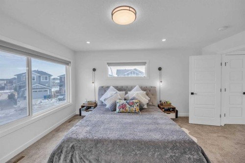 97 Baysprings Gardens Sw, Airdrie, AB - Indoor Photo Showing Bedroom
