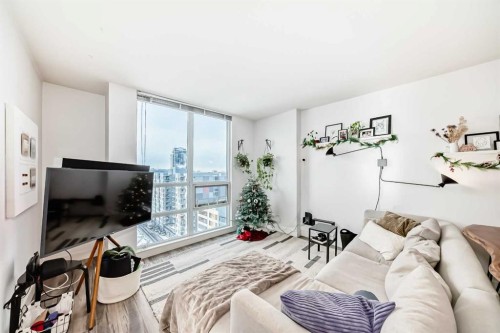 1404-1110 11 Street Sw, Calgary, AB - Indoor Photo Showing Living Room