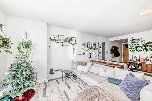 1404-1110 11 Street Sw, Calgary, AB - Indoor Photo Showing Living Room