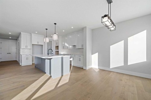 68 Heritage Ridge, Cochrane, AB - Indoor Photo Showing Kitchen With Upgraded Kitchen