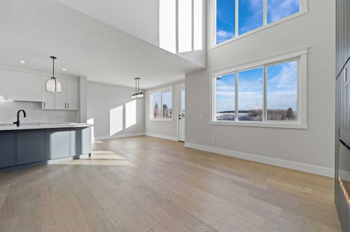 68 Heritage Ridge, Cochrane, AB - Indoor Photo Showing Kitchen With Upgraded Kitchen