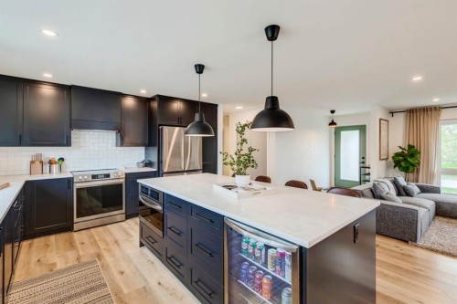 1240 Mapleglade Crescent Se, Calgary, AB - Indoor Photo Showing Kitchen With Double Sink With Upgraded Kitchen