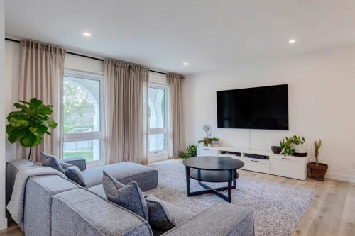 1240 Mapleglade Crescent Se, Calgary, AB - Indoor Photo Showing Living Room