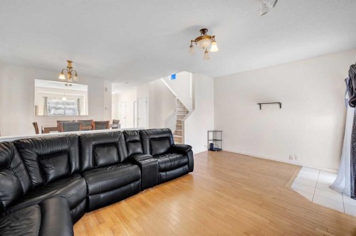 137 Martinpark Way Ne, Calgary, AB - Indoor Photo Showing Living Room