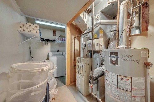 137 Martinpark Way Ne, Calgary, AB - Indoor Photo Showing Laundry Room