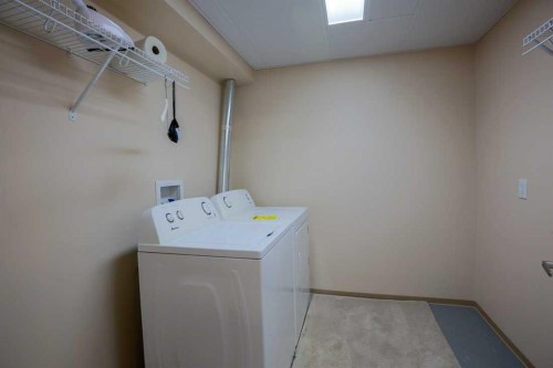 1105 Hammond Avenue, Crossfield, AB - Indoor Photo Showing Laundry Room