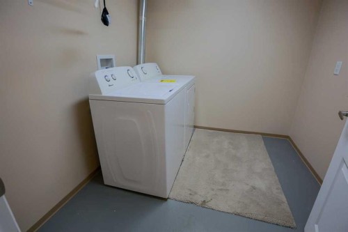 1105 Hammond Avenue, Crossfield, AB - Indoor Photo Showing Laundry Room
