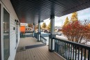 1105 Hammond Avenue, Crossfield, AB  - Outdoor With Deck Patio Veranda With Exterior 