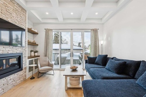 2835 42 Street Sw, Calgary, AB - Indoor Photo Showing Living Room With Fireplace