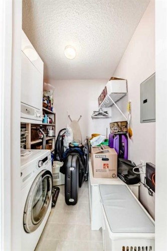 410-5000 Somervale Court Sw, Calgary, AB - Indoor Photo Showing Laundry Room