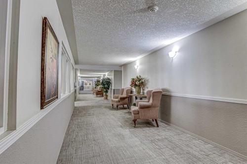 410-5000 Somervale Court Sw, Calgary, AB - Indoor Photo Showing Other Room