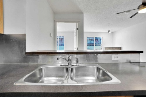 4109-70 Panamount Drive Nw, Calgary, AB - Indoor Photo Showing Kitchen With Double Sink