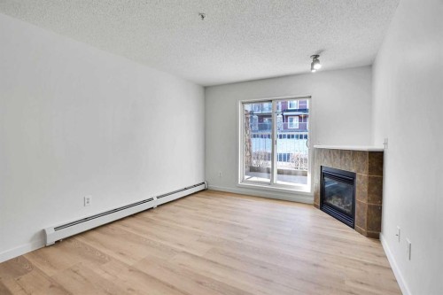 4109-70 Panamount Drive Nw, Calgary, AB - Indoor With Fireplace