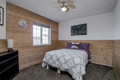 212 Cove Court, Chestermere, AB - Indoor Photo Showing Bedroom