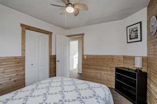 212 Cove Court, Chestermere, AB - Indoor Photo Showing Bedroom
