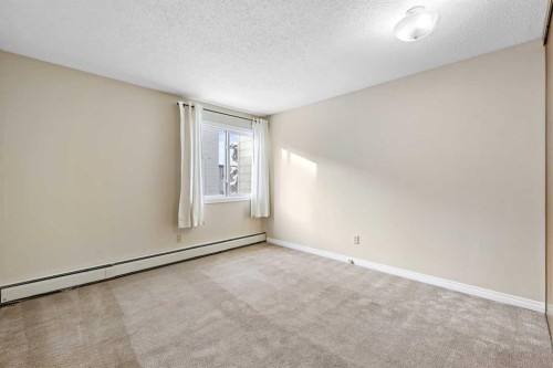 3211-80 Glamis Drive Sw, Calgary, AB - Indoor Photo Showing Other Room
