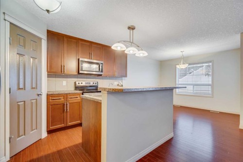 113 Cimarron Grove Close, Okotoks, AB - Indoor Photo Showing Kitchen