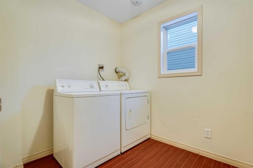 113 Cimarron Grove Close, Okotoks, AB - Indoor Photo Showing Laundry Room