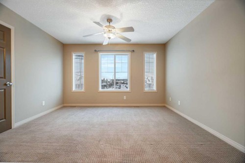 113 Cimarron Grove Close, Okotoks, AB - Indoor Photo Showing Other Room