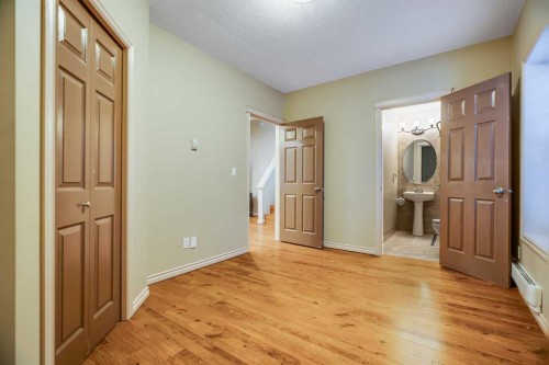 113 Cimarron Grove Close, Okotoks, AB - Indoor Photo Showing Other Room