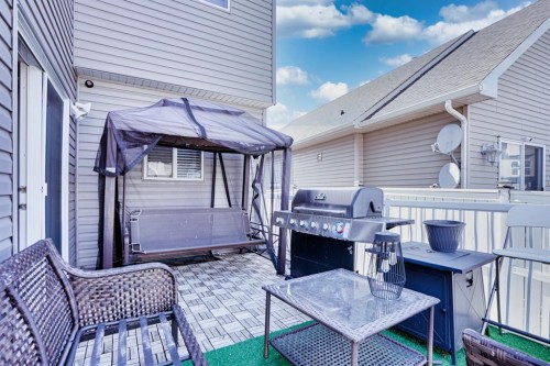 77 Saddleland Drive Ne, Calgary, AB - Outdoor With Deck Patio Veranda With Exterior