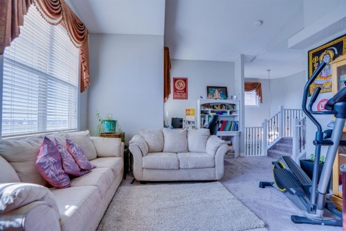 77 Saddleland Drive Ne, Calgary, AB - Indoor Photo Showing Living Room