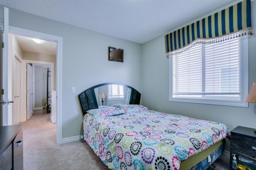 77 Saddleland Drive Ne, Calgary, AB - Indoor Photo Showing Bedroom