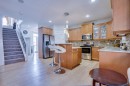 77 Saddleland Drive Ne, Calgary, AB  - Indoor Photo Showing Kitchen With Upgraded Kitchen 