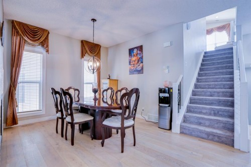 77 Saddleland Drive Ne, Calgary, AB - Indoor Photo Showing Dining Room