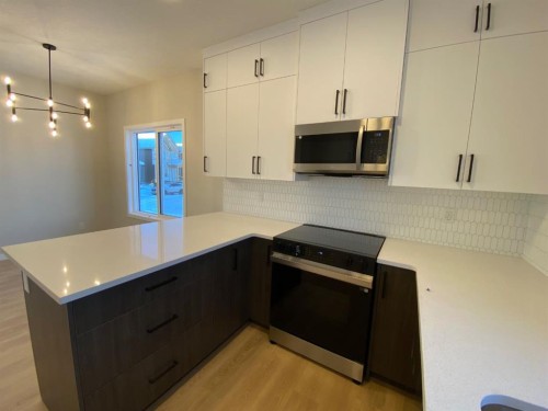 341 Ellen Park, Crossfield, AB - Indoor Photo Showing Kitchen