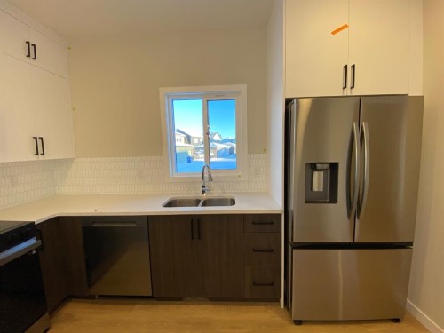 341 Ellen Park, Crossfield, AB - Indoor Photo Showing Kitchen With Stainless Steel Kitchen With Double Sink