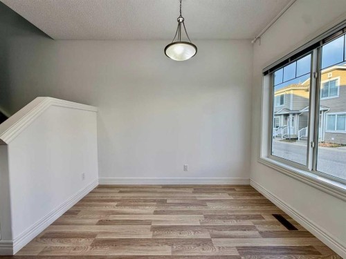 17 Bridleridge Manor Sw, Calgary, AB - Indoor Photo Showing Other Room