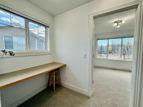 17 Bridleridge Manor Sw, Calgary, AB - Indoor Photo Showing Other Room