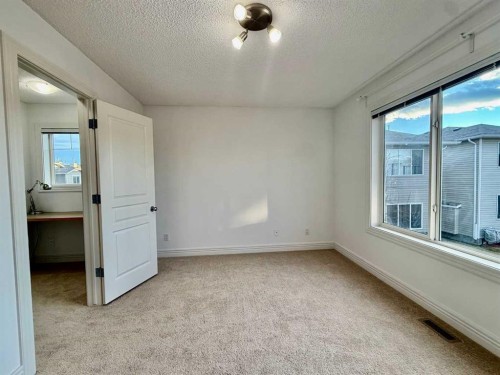 17 Bridleridge Manor Sw, Calgary, AB - Indoor Photo Showing Other Room