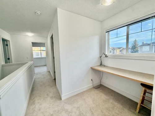 17 Bridleridge Manor Sw, Calgary, AB - Indoor Photo Showing Other Room