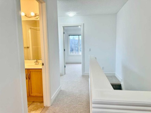 17 Bridleridge Manor Sw, Calgary, AB - Indoor Photo Showing Other Room