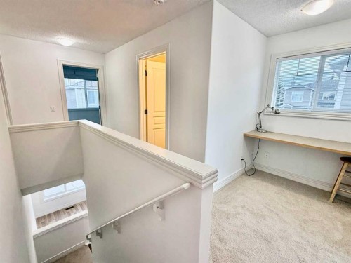 17 Bridleridge Manor Sw, Calgary, AB - Indoor Photo Showing Other Room