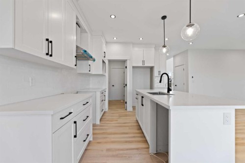 9 Mcclung Gate, Carstairs, AB - Indoor Photo Showing Kitchen With Upgraded Kitchen