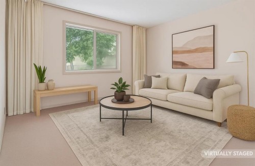 427 Tache Avenue Nw, Calgary, AB - Indoor Photo Showing Living Room