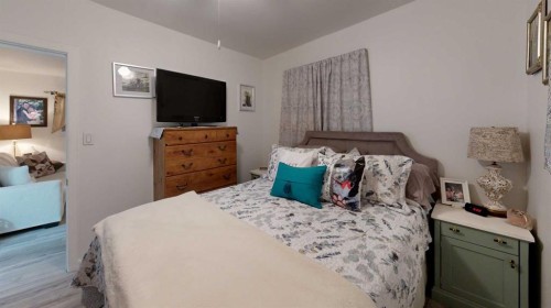 5092 51 Avenue, Stavely, AB - Indoor Photo Showing Bedroom
