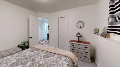 5092 51 Avenue, Stavely, AB - Indoor Photo Showing Bedroom
