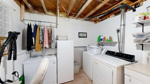 5092 51 Avenue, Stavely, AB - Indoor Photo Showing Laundry Room