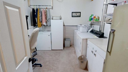 5092 51 Avenue, Stavely, AB - Indoor Photo Showing Laundry Room