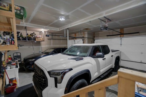 300 Aspenmere Way, Chestermere, AB - Indoor Photo Showing Garage