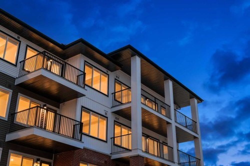 2302-6 Merganser Drive West, Chestermere, AB - Outdoor With Balcony With Exterior