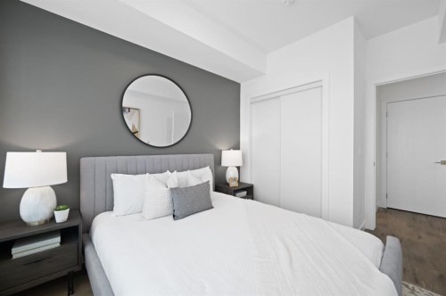 2302-6 Merganser Drive West, Chestermere, AB - Indoor Photo Showing Bedroom