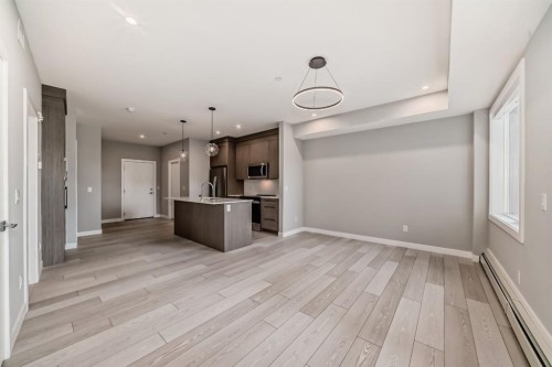 1218-6 Merganser Drive West, Chestermere, AB - Indoor Photo Showing Other Room