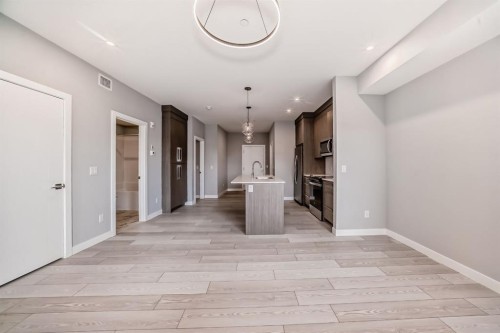 1218-6 Merganser Drive West, Chestermere, AB - Indoor Photo Showing Other Room