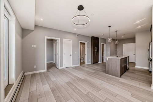 1218-6 Merganser Drive West, Chestermere, AB - Indoor Photo Showing Other Room